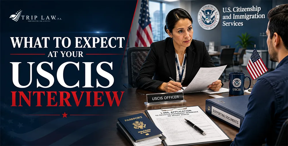 USCIS officer conducting an immigration interview with an applicant reviewing documents and adjustment of status paperwork.